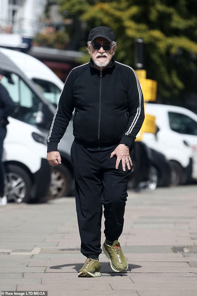 On the bright side: The Succession star, 77, cut a calm figure as he walked through the affluent suburb as he recovered from the virus