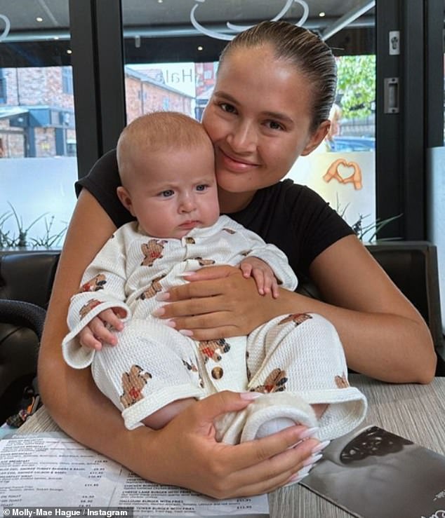 Baby love: She confessed she felt 'anxious' about leaving seven-month-old daughter Bambi behind on her latest work trip