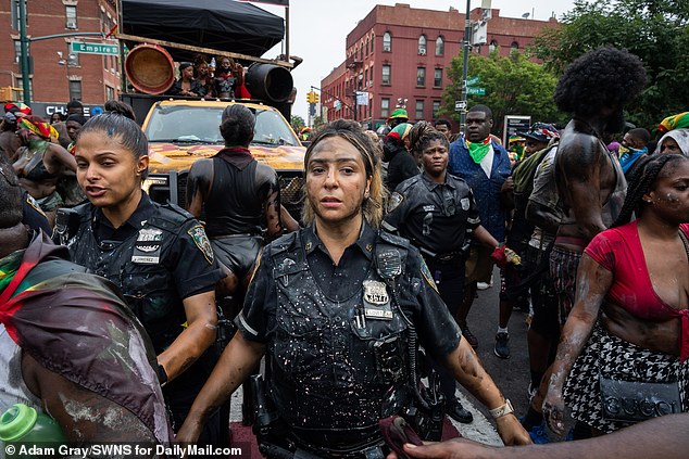 The move was announced during a safety briefing aimed at J'ouvert, taking place Monday.  Pictured: J'ouvert carnival parade in Brooklyn last year