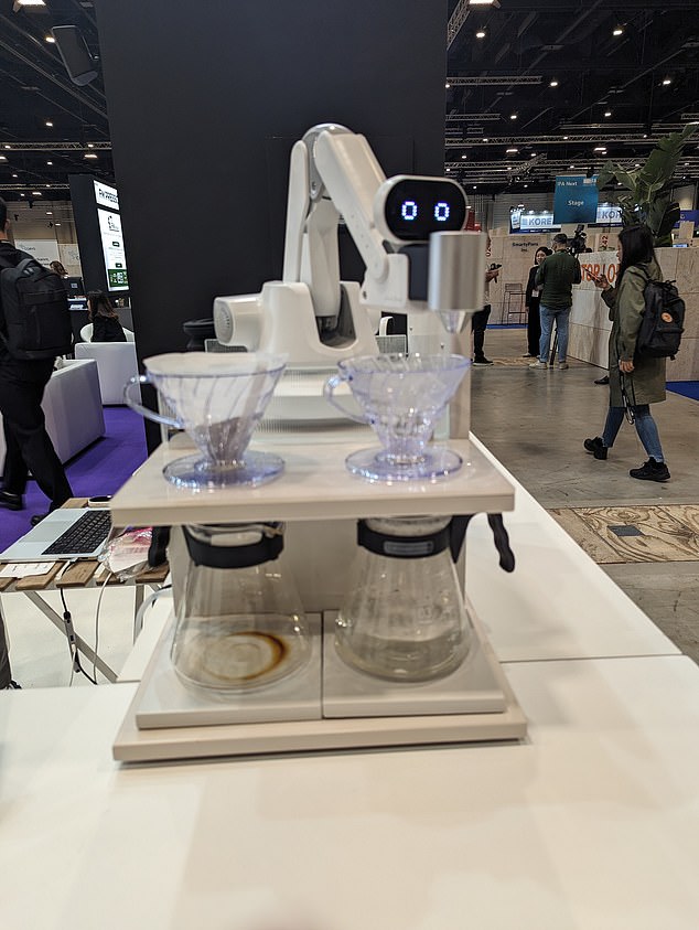 The HUENIT robotic arm can serve coffee and perform many other tasks (Photo Rob Waugh)