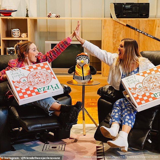 Two Friends fans hang out at Chandler and Joey's apartment