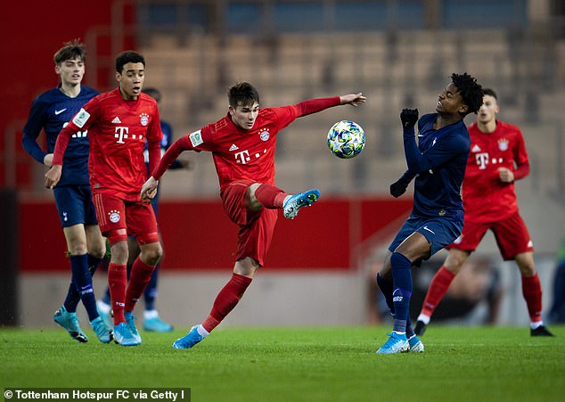 Booth (centre) turned down multiple contract extension offers from Bayern Munich before joining FC Utrecht last summer - a gamble that has paid off with regular first-team football