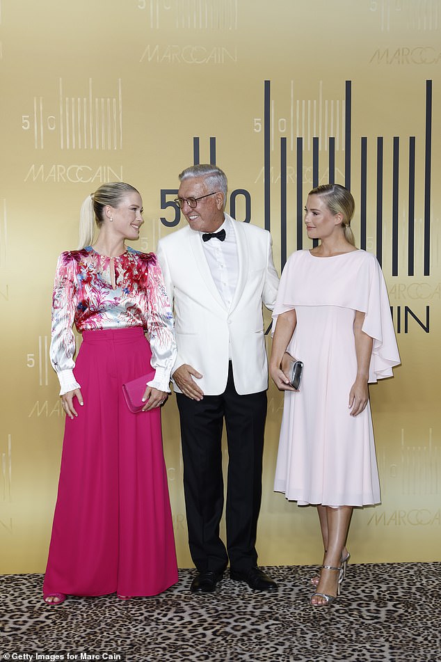 The sisters pictured with Helmut Schlotterer at the Marc Cain Fashion Show to celebrate their 50th anniversary