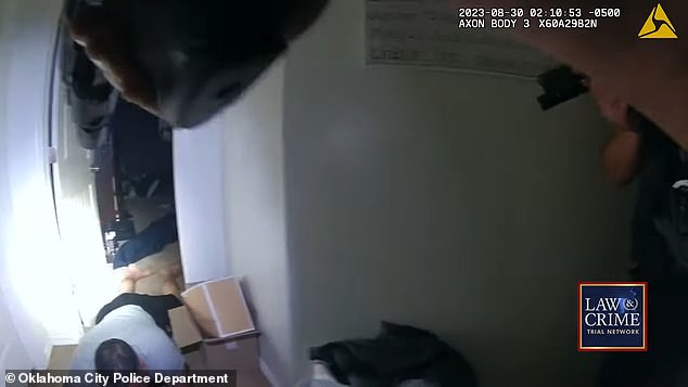 The bodycam footage shows Cannon crawling out of the bedroom, apparently on the phone with an uncle