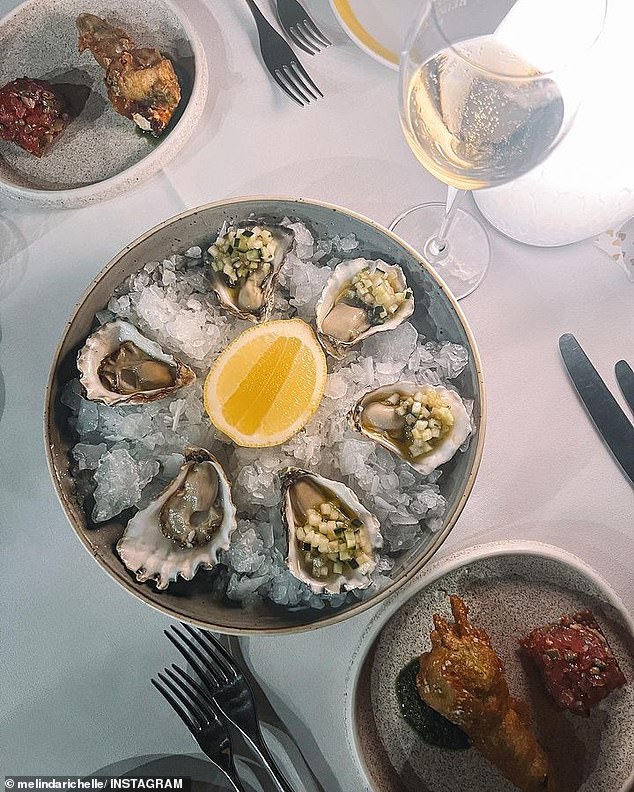 Dressed to impress in matching black ensembles, the Married At First Sight couple enjoyed an extravagant dinner filled with wine and oysters as they celebrated