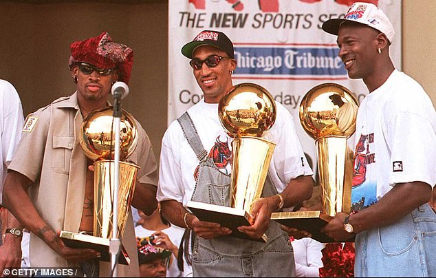 Rodman (L) won three straight NBA championships during his time with the Chicago Bulls