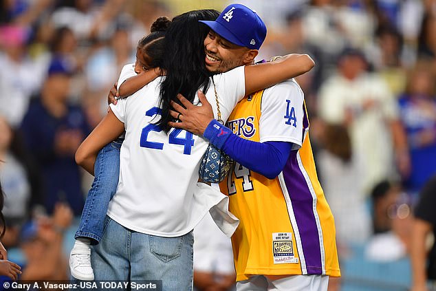 She shared a hug with Dodgers MVP candidate Mookie Bets while wearing a Kobe jersey