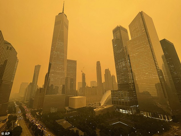 The sky in New York turned orange last month due to the magnitude of the Canadian wildfires.  Pictured: The Big Apple shrouded in smog on June 7 this year