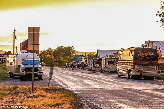 Burning Man organizers tell burners to shelter in place, not operate generators or other electrically powered instruments standing in water, and cover anything electrical