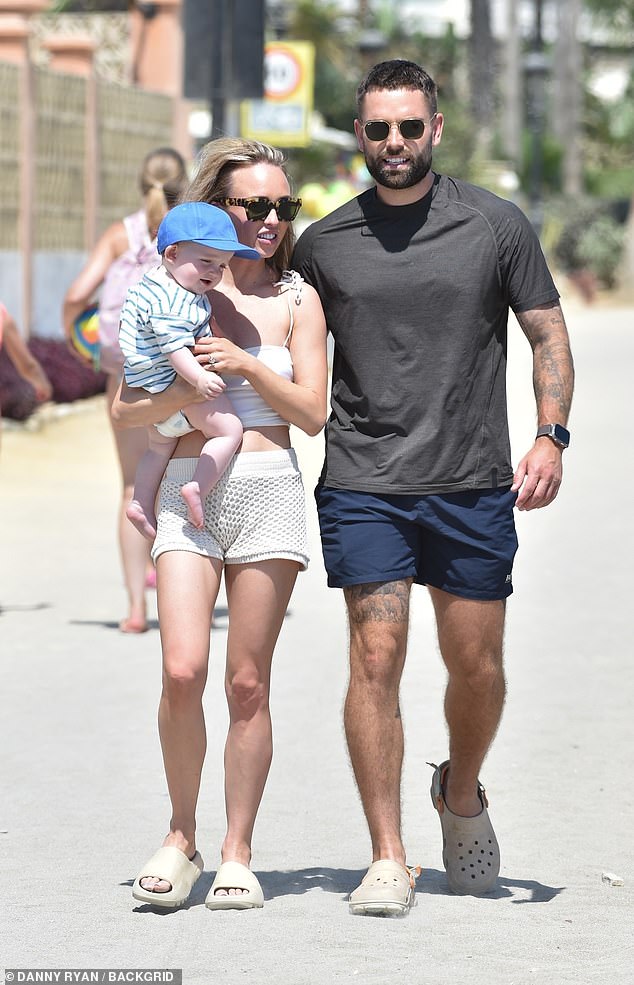 Family outing: Jorgie put on a leggy show for the outing as she donned beige shorts which she paired with a white crop top.c