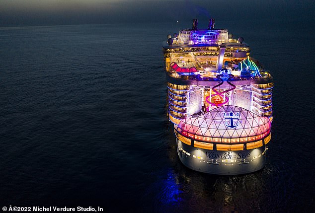 The megaship is 350 meters long and has 18 decks and features amenities such as a card room, jogging track, laser tag, miniature golf, an outdoor movie screen, rock climbing walls, a solarium, karaoke and a 'vitality spa'.