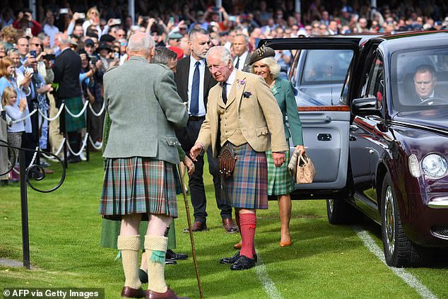 British King Charles III and British Queen Camilla arrive to attend the annual Braemar Gathering in Braemar, Scotland