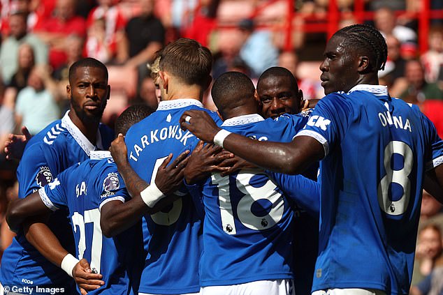 Doucoure celebrated with his teammates after seizing Wes Foderingham's save