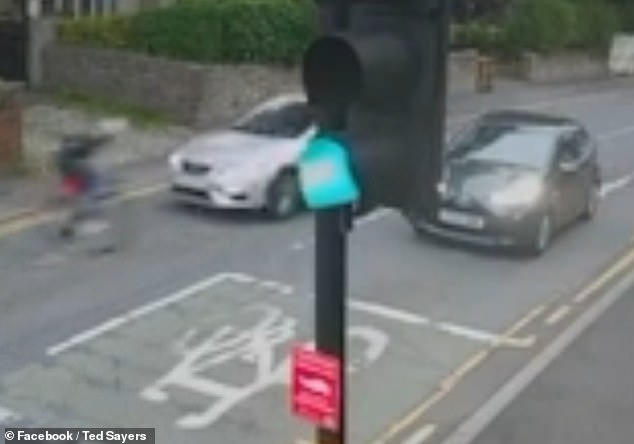 The lights for traffic coming from the direction the cyclist was traveling were green