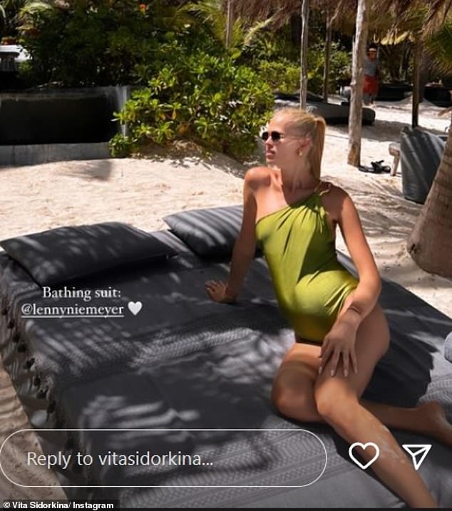 Wow: Vita appeared to be enjoying her day at the beach as she stunned in a dark green one-shoulder swimsuit that showed off her pregnancy curves