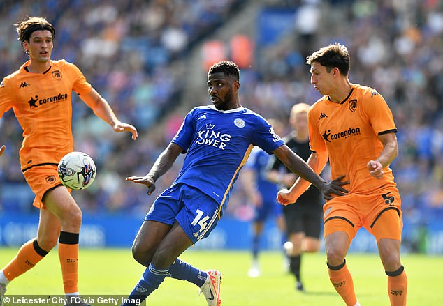 Kelechi Iheanacho of Leicester City fights against Alfie Jones of Hull City during the match