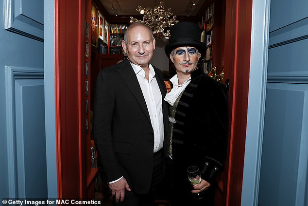 Demsey, pictured with MAC Cosmetics president Philippe Pinatel, who labeled the poster boy 