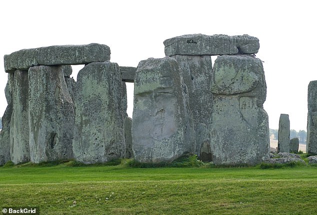 Trump's face appears on one of the 13-foot-tall, 25-ton vertical stones on the north side