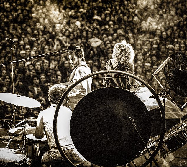 Danny captured this image of The Who on a wet evening in May, which he says is one of his favorite shots of the band ever, as they perform in front of a huge crowd of fans