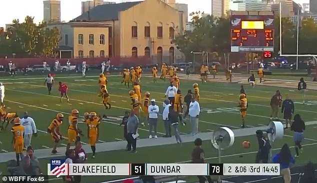 Across the country in Baltimore, Maryland, another shooting occurred Friday night at a football game at Dunbar High School, pictured above