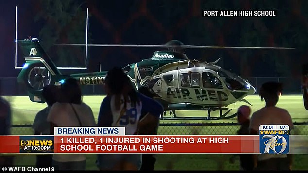 A medical helicopter landed on the field at Port Allen High and the two victims were rushed to hospital on Friday night, where the teenager was pronounced dead.