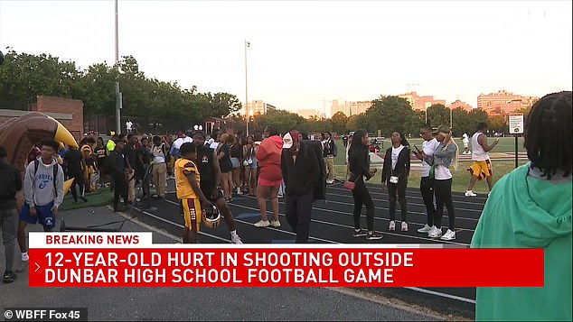 Fans ducked into the stands or took shelter in a concession stand