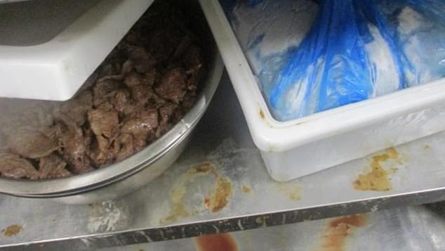 The restaurant's owners and a director were fined a total of $24,500 on several counts, including failure to prevent rodents from entering, poor cleaning practices, and substandard food storage.  Pictured: blood and other material on the shelves