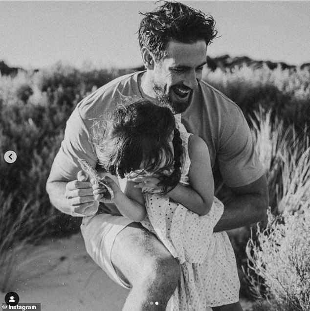 Supermodel Megan Gale, 48, shared a heartwarming tribute to her fiancé Shaun Hampson by posting two photos of him playing with their child