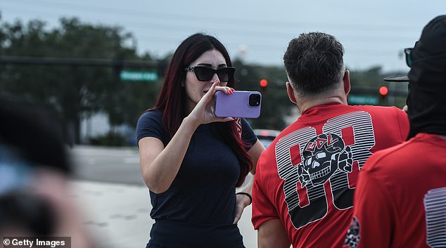 1693713738 829 White supremacists march on Orlando waving swastika flags and raising