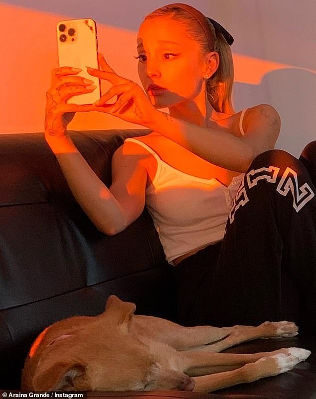 Lounging: Grande also gave her 380 million followers a peek inside her LA home as she snapped a sunset selfie on her couch