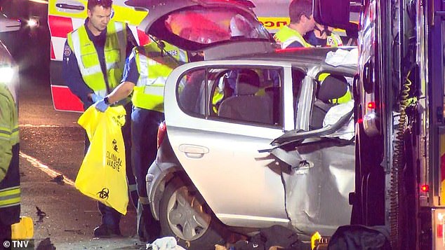 The suspected stolen Mercedes collided with another car on a suburban street, killing a brother and sister (photo, emergency services at the scene of the accident)