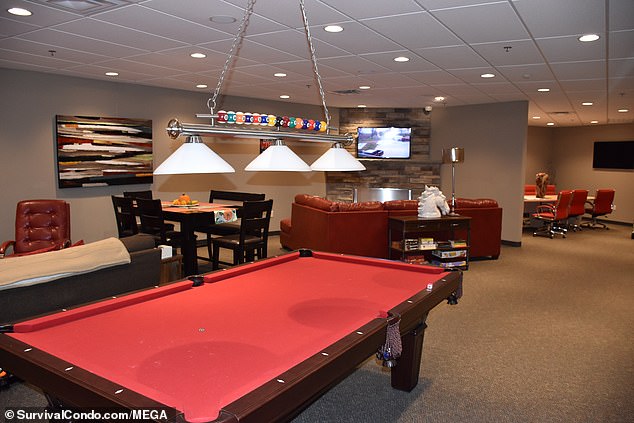 In the photo a playroom in the apartment.  The common areas are on the upper levels, while the individual living units sit below.