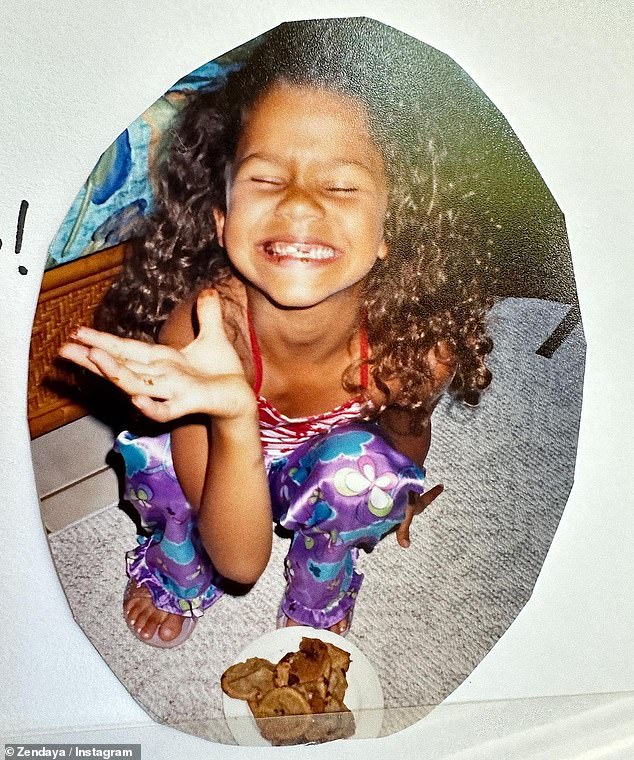 Very cute!  Zendaya celebrated her 27th birthday by sharing an adorable childhood photo of her beaming with joy while crouching in front of a plate of cookies