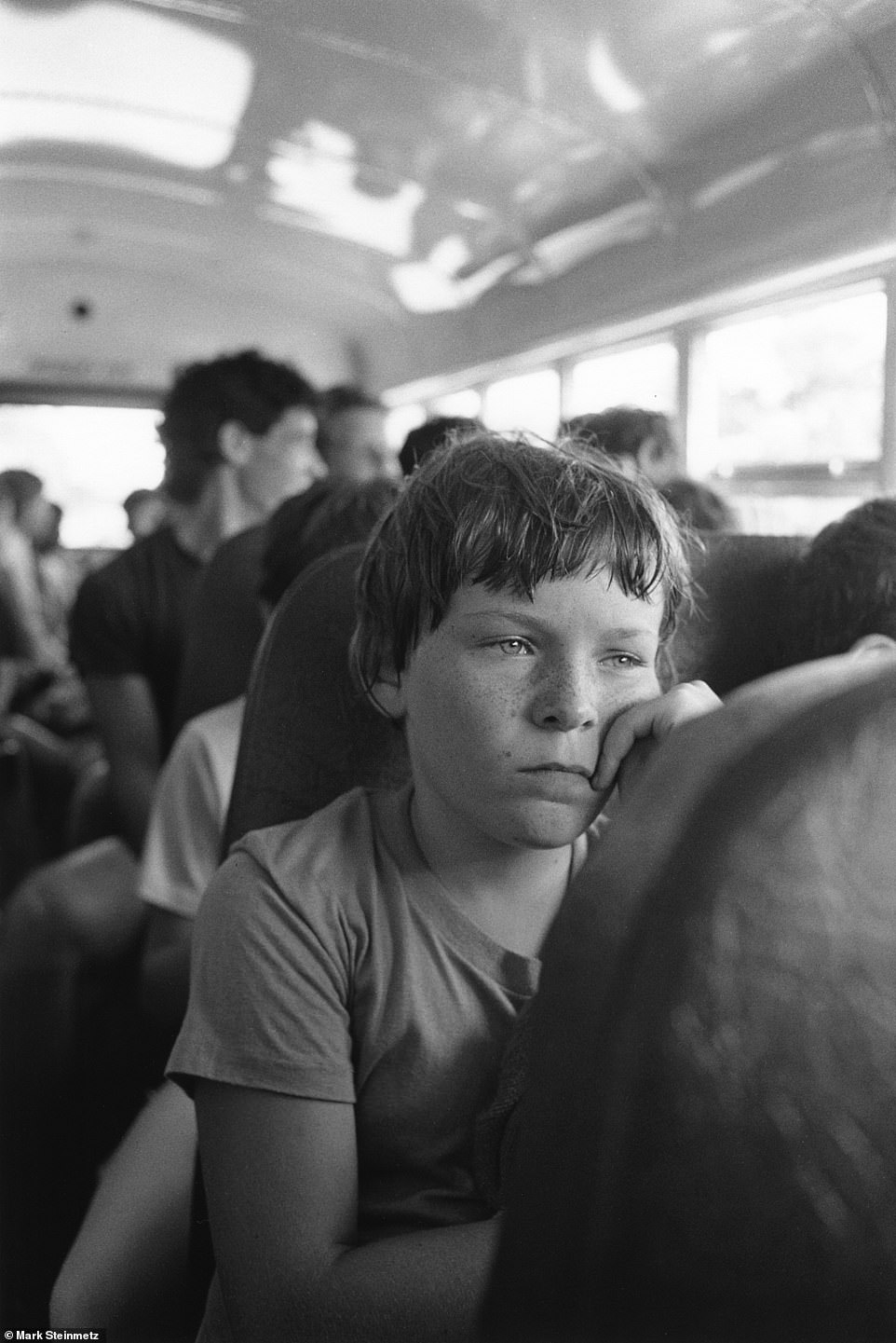 The hardest part of summer camp is leaving (pictured shows a young boy looking glum while on a bus)