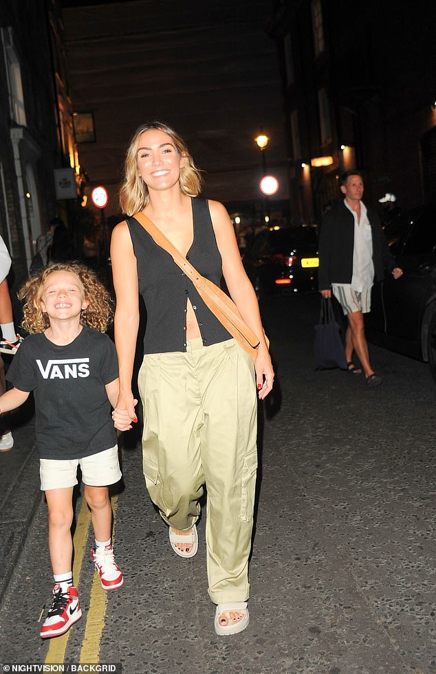 Sweet: Frankie Bridge left the Apollo Theater along with her family after her last performance in 2:22 A Ghost Story on Tuesday (pictured with Carter, eight)