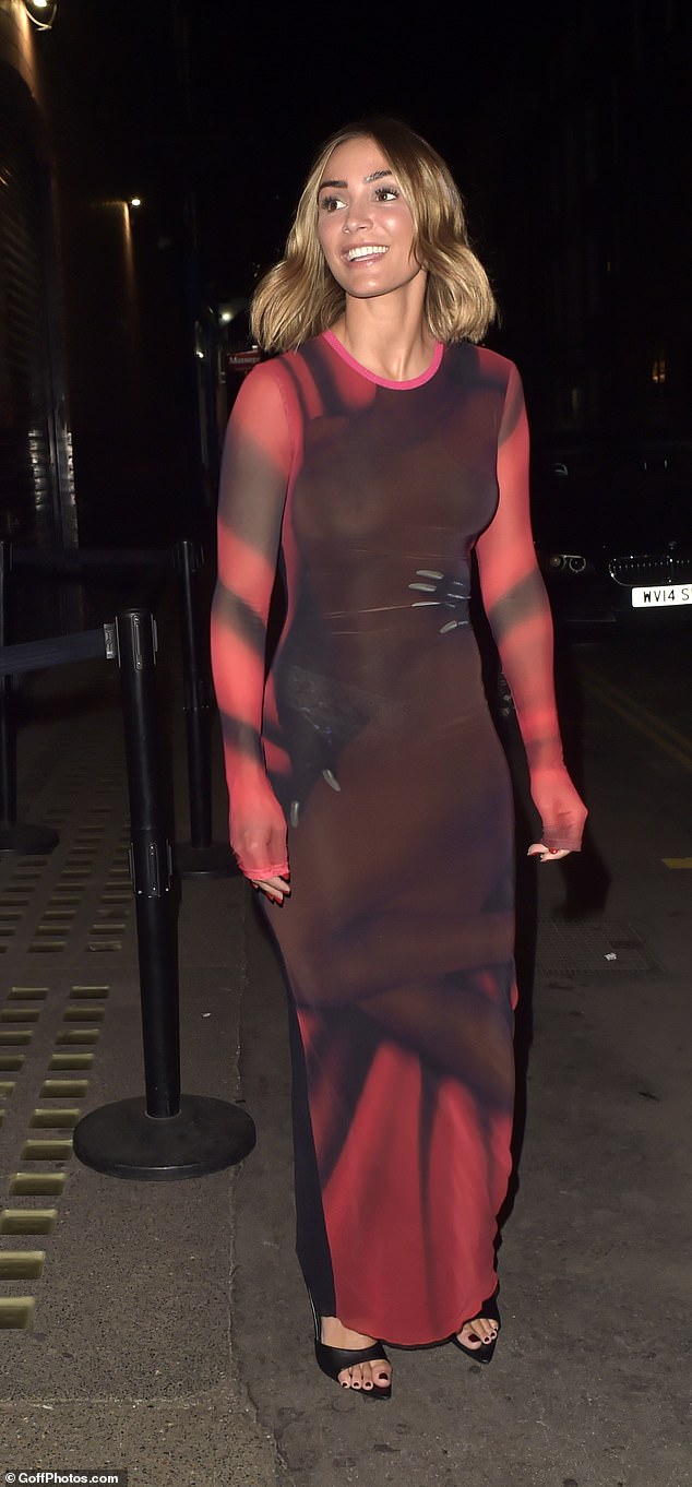 Sheer delight: Frankie was a vision in a semi-sheer scarlet and purple £895 Loewe gown