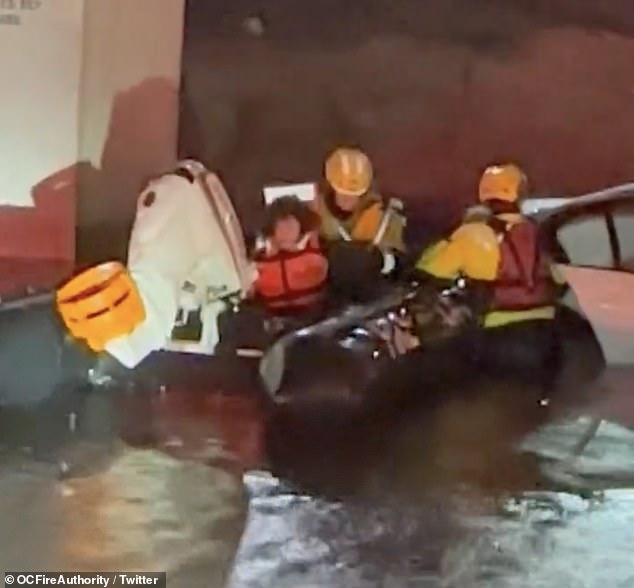 For some trapped by the New Year's flood, a boat was the only means of escape