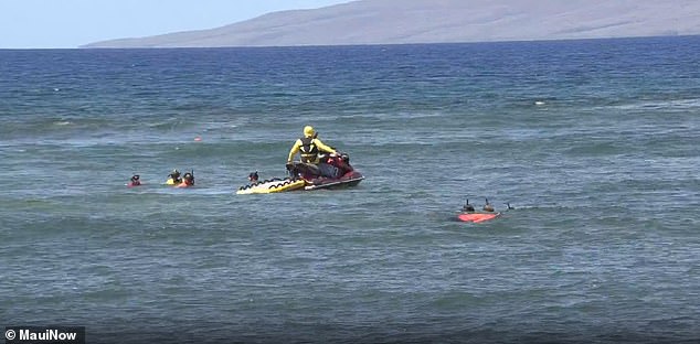 Dive crews search for debris in the water around Lahaina