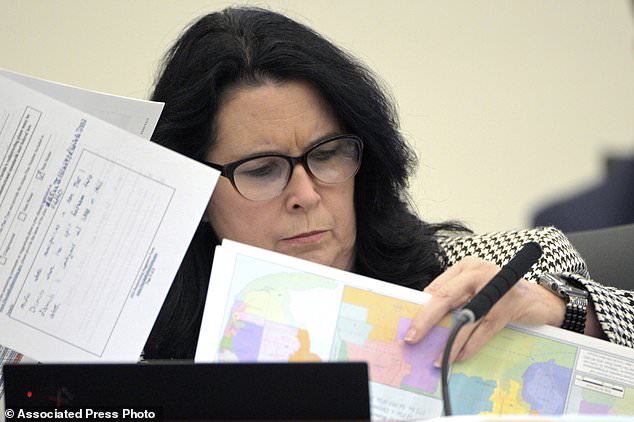 State Senator Kelli Stargel reviews redistribution maps during a Senate Judiciary Committee hearing on January 13, 2022 in Tallahassee.  On Saturday, a state judge ruled that Florida's redistricting plan, under pressure from Governor DeSantis, violates the state constitution