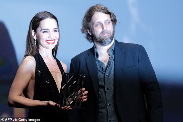 Proud: The star was pictured receiving the award from French director Alexandre Aja, member of the Jury of Revelations, ahead of the presentation of her film