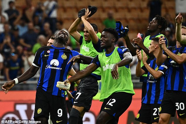 The Inter players celebrate their third successive win in the league as they continue their 100 per cent start