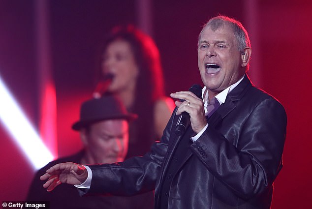 John Farnham, 74, has provided his iconic song You're The Voice for an official advert for the Yes campaign, which features a family watching iconic moments from Australian history on TV, such as Cathy Freeman winning gold at the 2000 Olympics (he is pictured in November 2016)