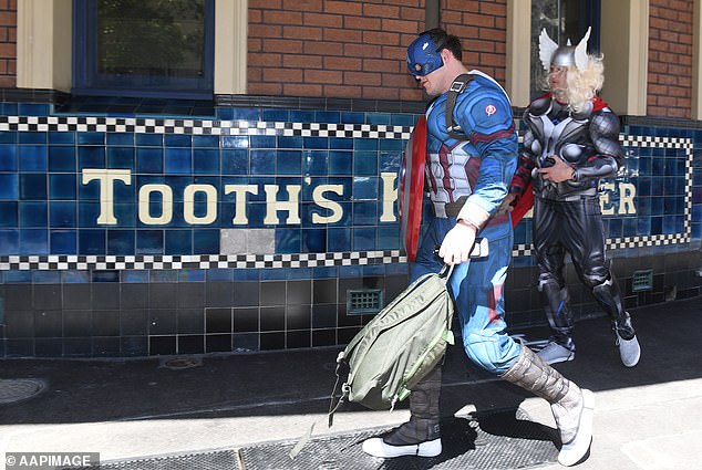 Former Bulldogs players Josh and Brett Morris are pictured dressed as Marvel superheroes for their Mad Monday celebrations at the time