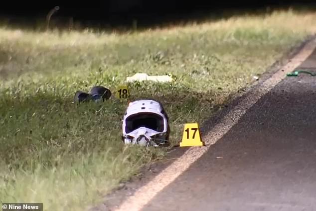 Helmet parts were seen scattered along the road on Sunday night as officers investigated the crash