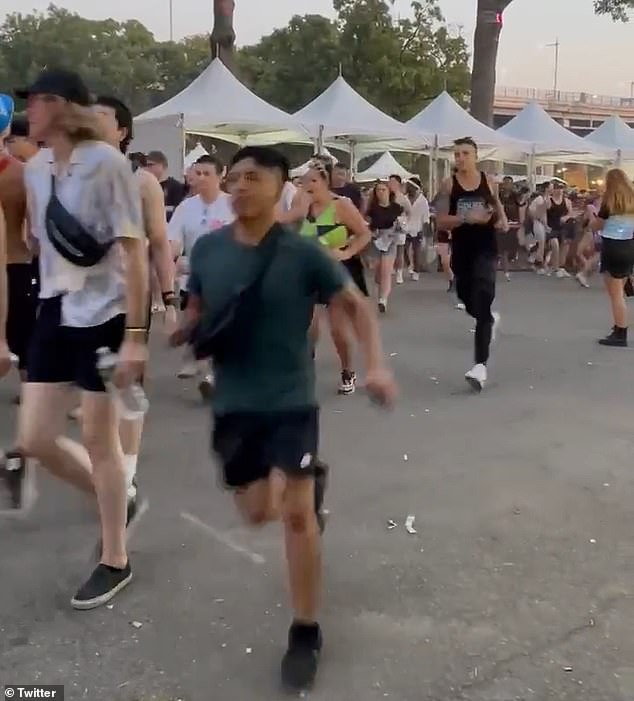 The security gate video shows hundreds of people rushing to the gate of the event to be held at Randall's Island