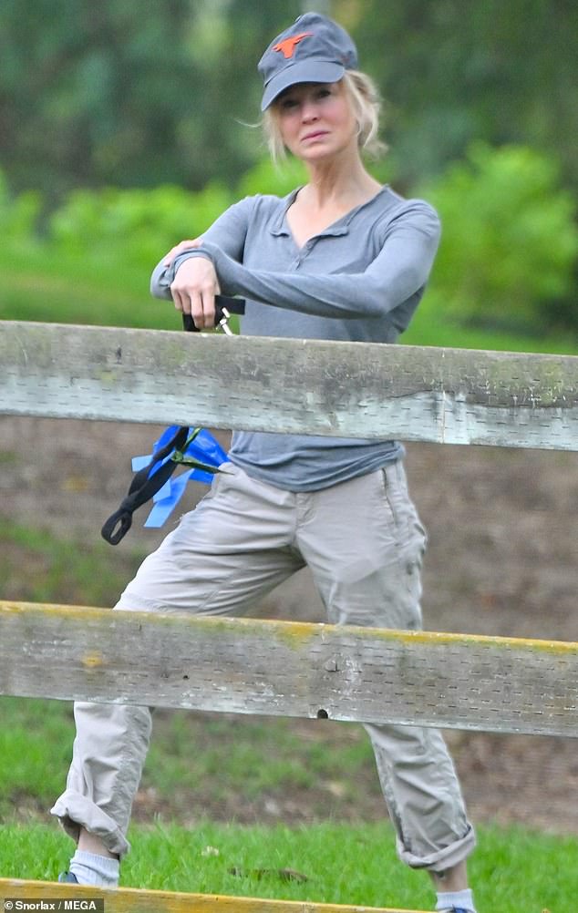 Stretching: Renee made sure she was completely limber for the dog walk