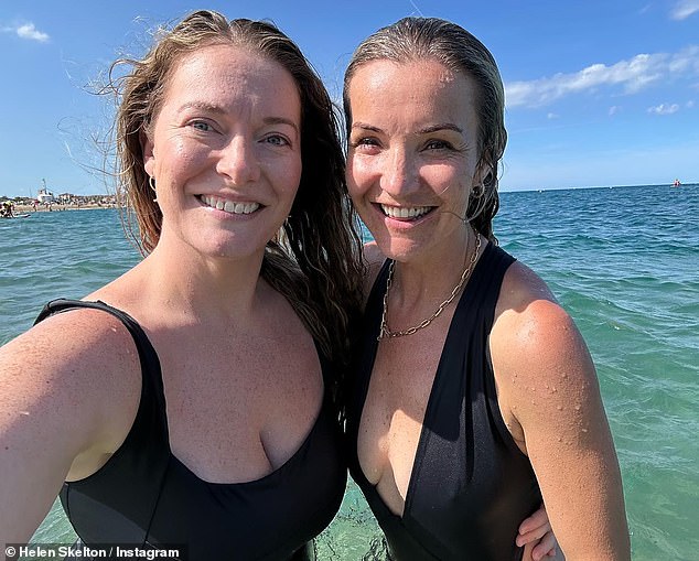 Gorgeous: The Countryfile presenter looked radiant as she splashed around in a plunging black swimsuit as she soaked up the sun with her closest loved ones