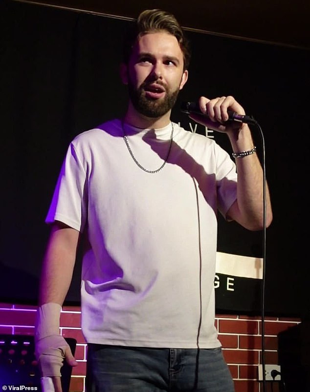 Rockwell (pictured last year speaking at a stand-up comedy event) was arrested in his luxury apartment for 'sex with a minor' and 'tapering the acts'