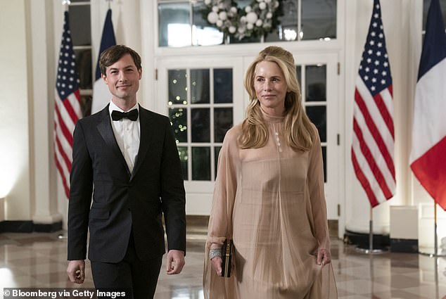 Laurene Powell Jobs, founder and president of the Emerson Collective, right, and Reed Jobs, arrive to attend a state dinner honoring French President Emmanuel Macron and Brigitte Macron.