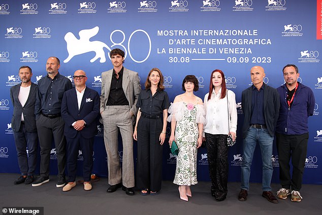 Radiant: Cailee beamed in a white off-the-shoulder dress with flounced sleeves and embellished with a green leaf pattern (RL Youree Henley, Jacob Elordi, Sofia Coppola, Cailee Spaeny, Priscilla Presley, Lorenzo Mieli)